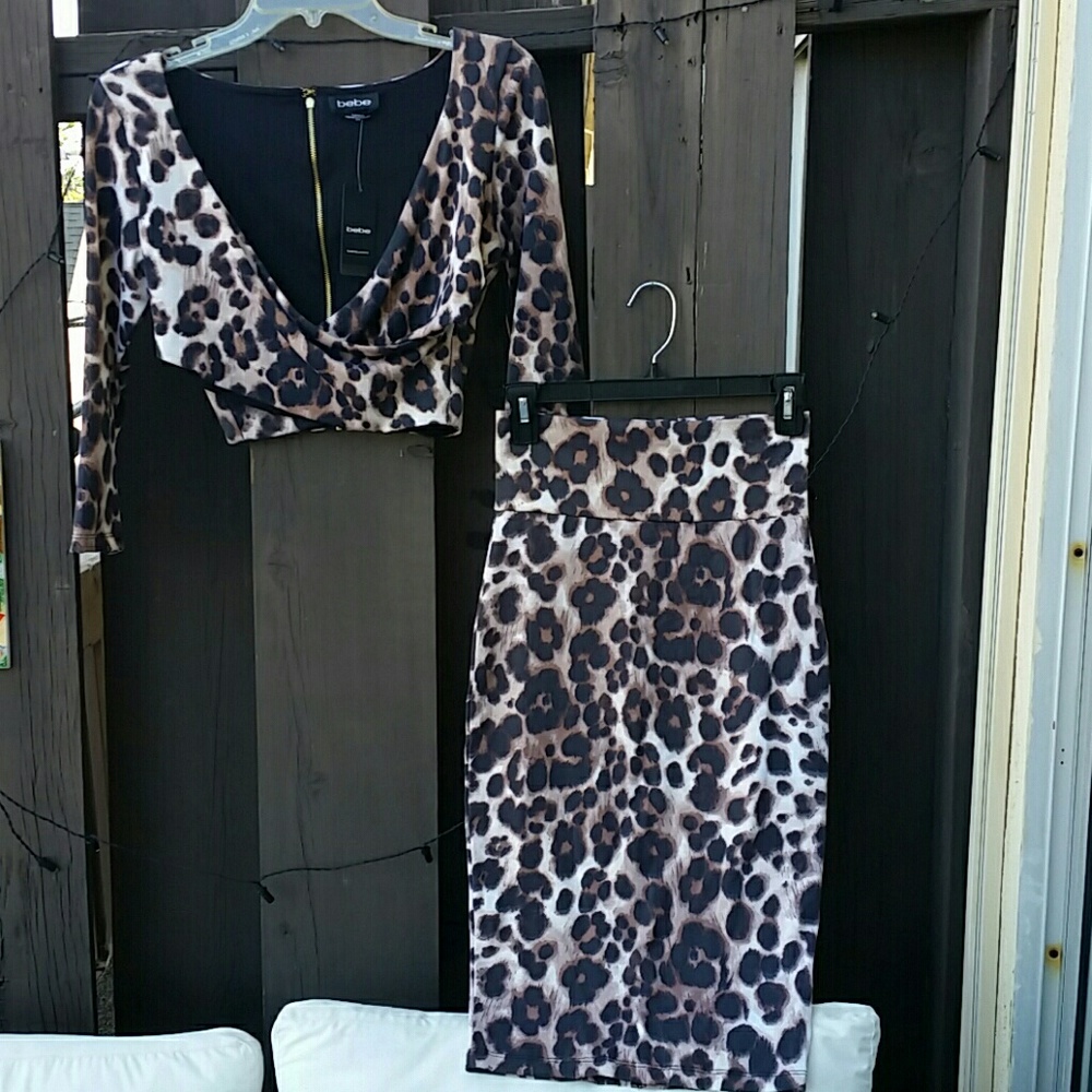 Bebe leopard blouse and skirt set.